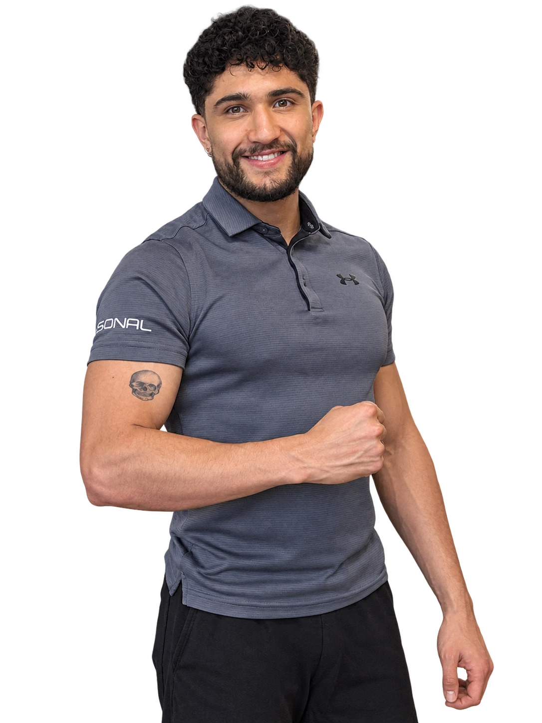 Julián Barragán, entrenador personal, sonriendo con polo gris